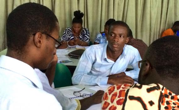 Public librarians in small group during Ghana training. 