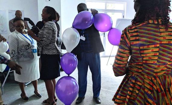 Kenya National Library Service trainers do an exercise with balloons during leadership training in May 2018. 